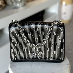 Stunning Micheal Kors bag, black & silver with silver hardware.